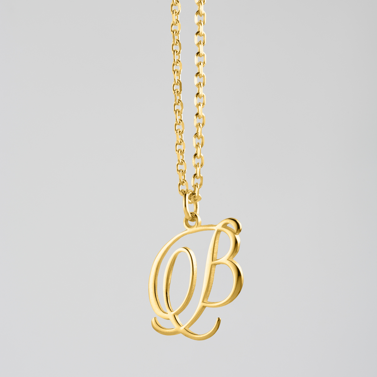 cursive letter necklace gold